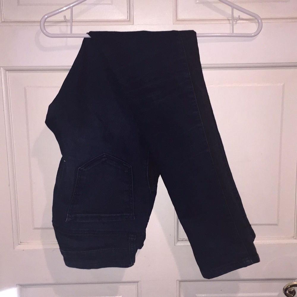 Skinny jeans size 9 with black strip down legs
